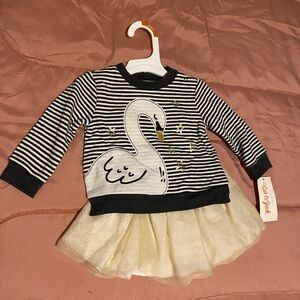 Infant 6-9 month 2 piece skirt set.